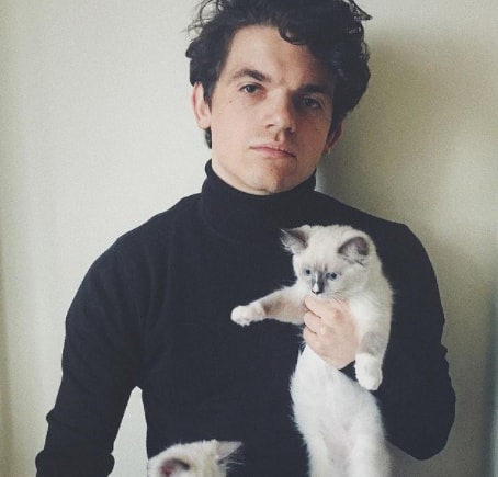 Edward Bluemel with his pet cat