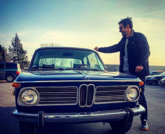 Mark Normand with his car