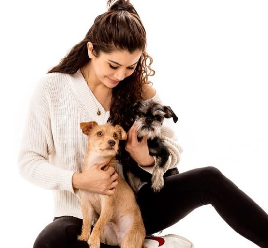 Praya Lundberg with her pet dogs