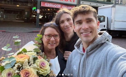Andrew with his mother and sister
