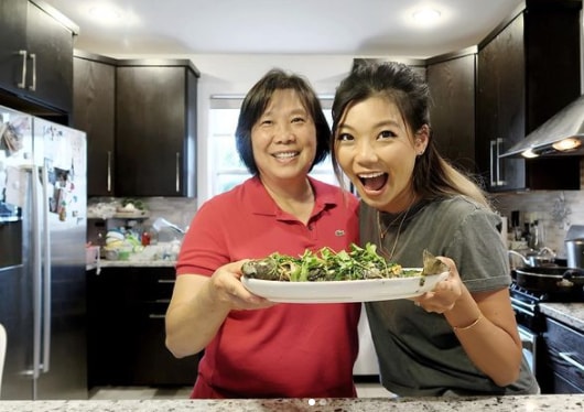 Helen Wu cooking with her mom.