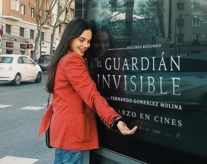 Martina Cardidi with the poster of her featured movie ‘’El guardian invisible’’ 