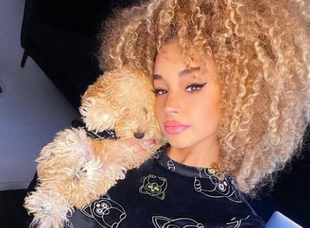 Dana Curly with her pet dog