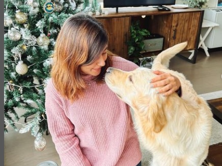 Kritika adores a dog