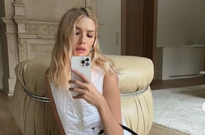 Lena Perminova in a mirror selfie pose