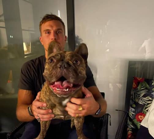 Luke Gulbranson and his pet dog