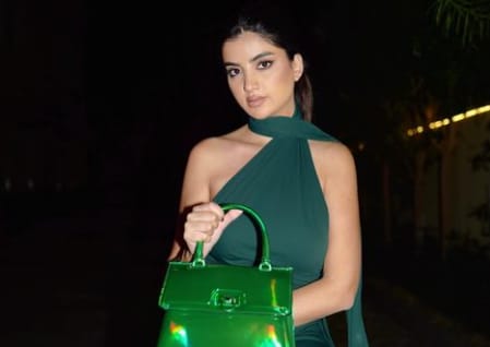 Ola Farahat looks stunning in a green outfit