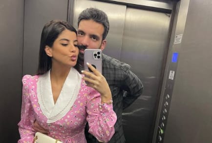 Ola Farahat with her husband taking selfies