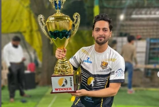 Ruhez Amrelia with the trophy of Ghanchi Youth Cricket League Season 2 [2022] Cup
