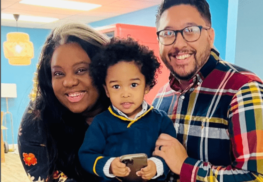 Morgan Harper Nichols' and her husband with their child