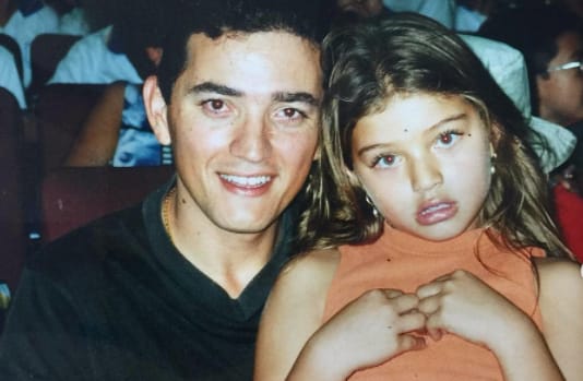 Daniela López with her dad, a childhood picture