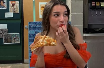 Ellie Dobleske eating Pizza