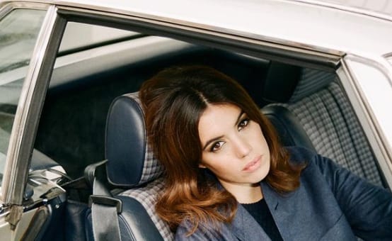 Gala Gordon posing in a car