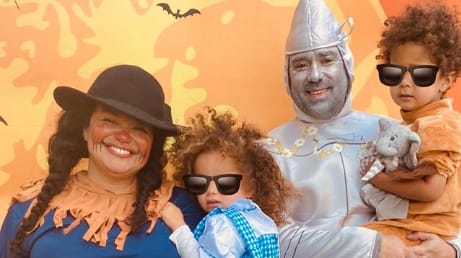 Michelle Buteau with her husband and kids celebrating Halloween festival