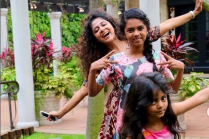 Poornima Indrajith with her daughters