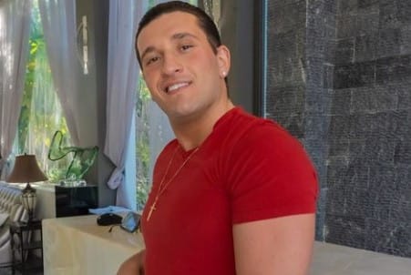 Joey Sasso looks dashing in a red T-shirt