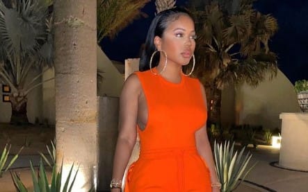 Minaa Monroe looks pretty and appealing in an orange color outfit