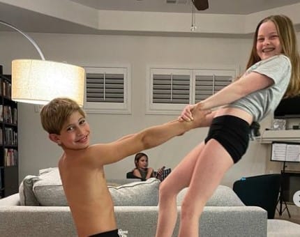 Nidal Ajib doing gymnastics with his sister