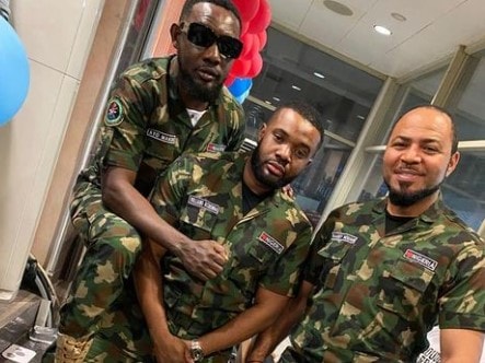 Ramsey Nouah with other actors in army dress