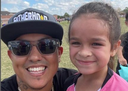Randy Gonzalez with his daughter