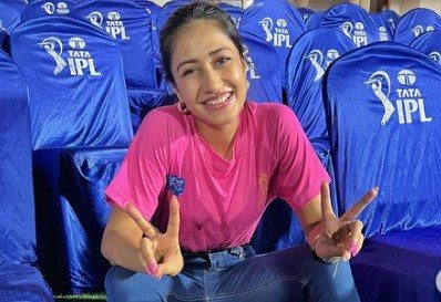 Dhanashree Verma wearing a pink dress to support IPL team Rajasthan Royals
