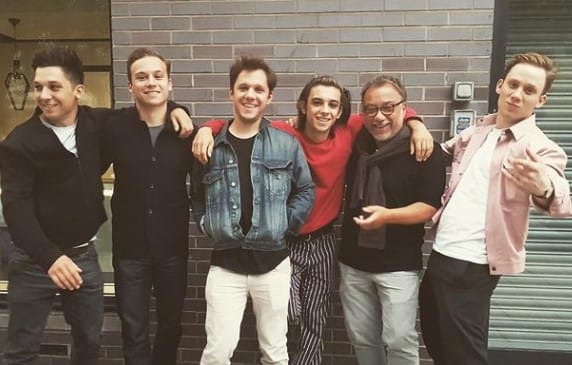 Finn Cole with his friends and  senior citizen