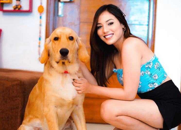 Ahana Goyal with her pet dog