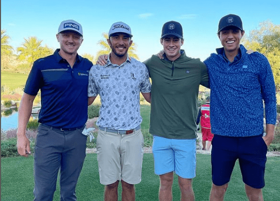 Garrett Clark with fellow golfers 
