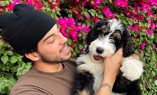 Luis Capecchi with his pet dog