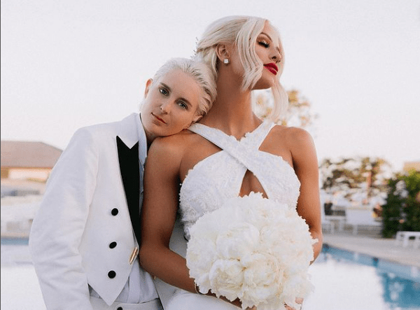 Nats Getty with her partner Gigi Gorgeous in wedding dress