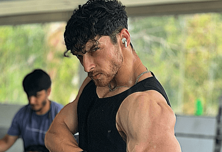 Rohit Chauhan showcasing his muscles