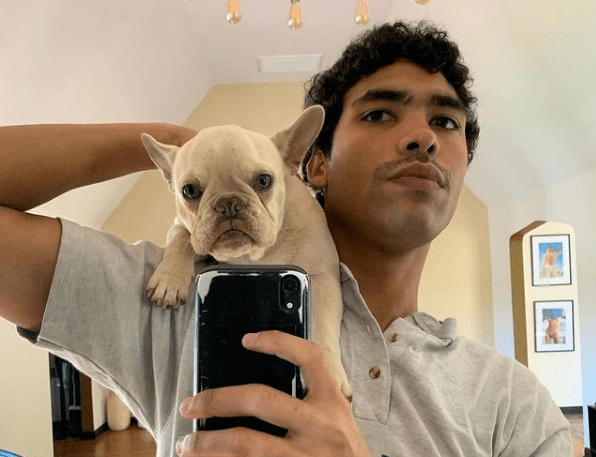 Alex Ordonez with his pet dog