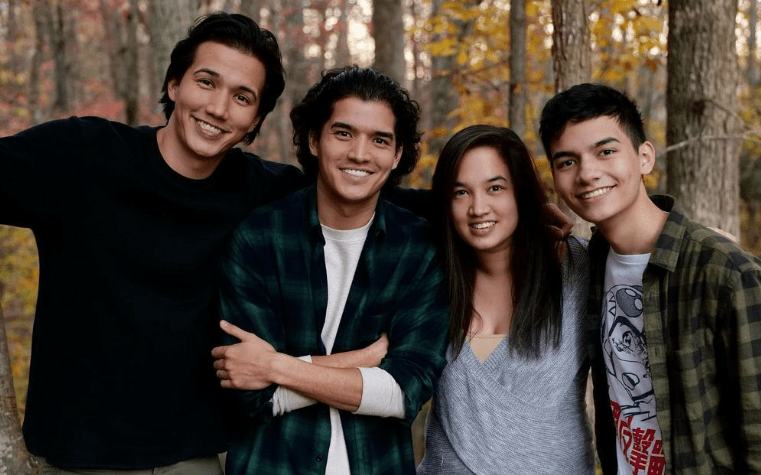 Alex Wassabi with his siblings
