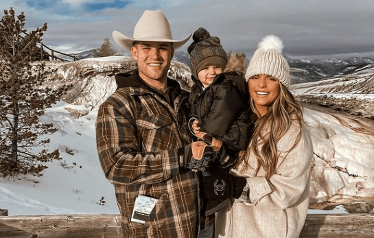 Casey Holmes with her husband and daughter enjoying vacation