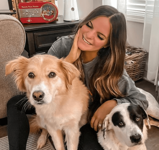 Casey Holmes with her pet dogs