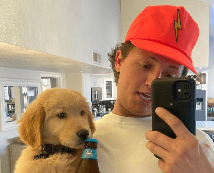 Conor Wood takes a selfie with his pet dog