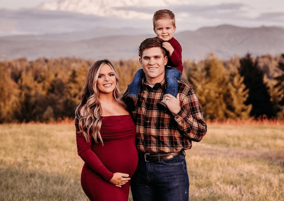 Davis Marlar spending quality time with his wife and son