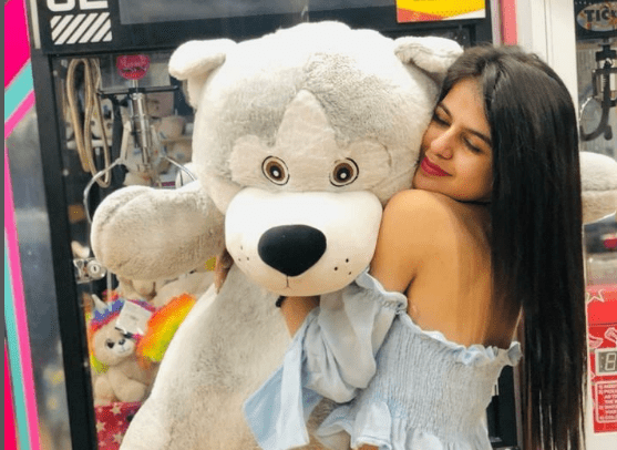 Kanishka Sharma hugging a teddy bear