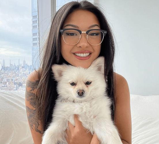 Mai Pham with her pet dog