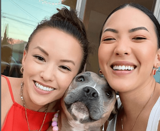 Stephanie Villa with her sister and pet dog