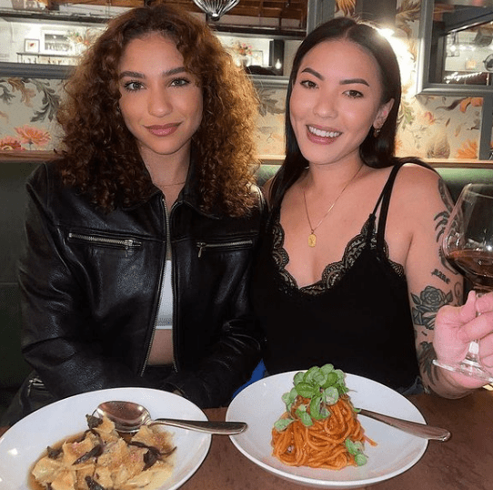 Stephanie Villa with her friend at a restaurant