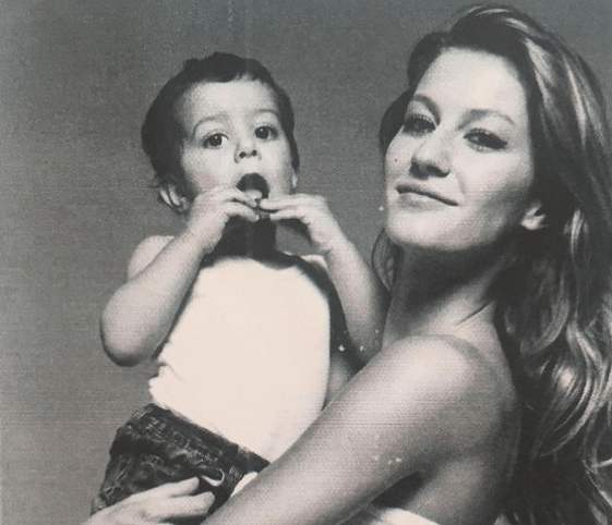 an old pic of Alex White with her son