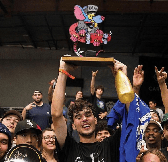 Jamie Griffin holds the trophy of the Battle at the Berrics