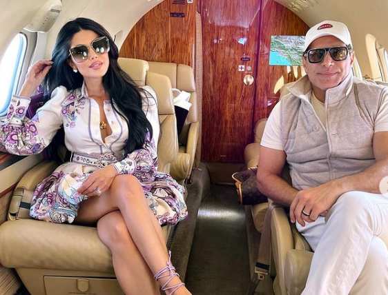 Manny Khoshbin with his wife Leyla Milani traveling on a charter plane
