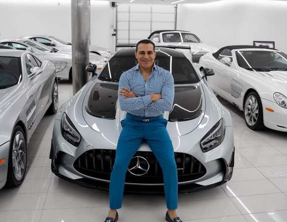Manny Khoshbin showcasing his luxurious car
