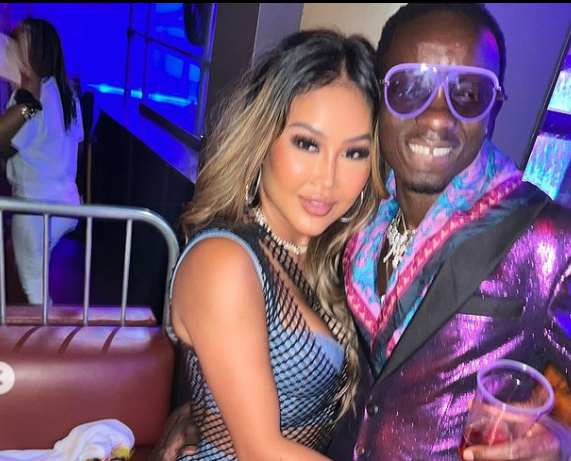 Michael Blackson with his wife doing party