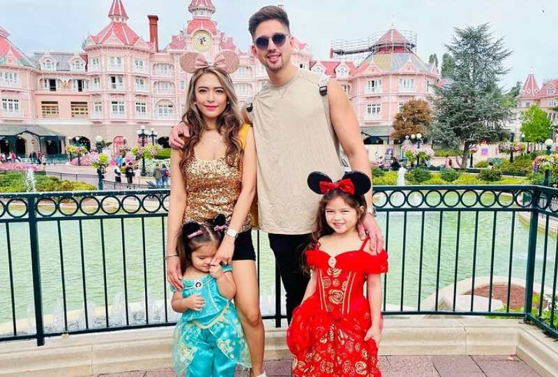 Valerie Garcia with her husband and daughters vising Disneyland Paris