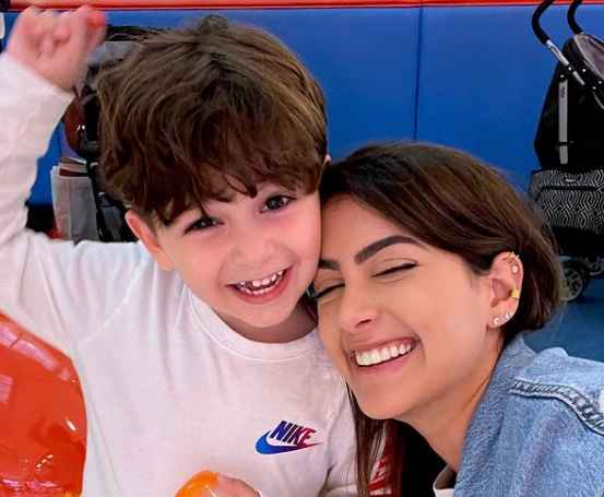 Amal Nemer with her child Damian Salemi
