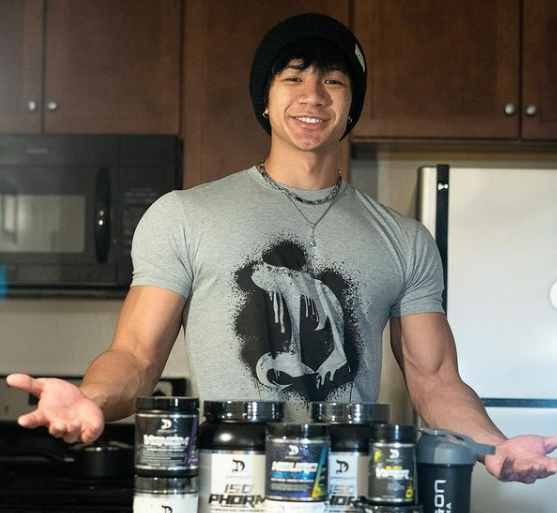 Ethan Nguyen showcasing his supplements