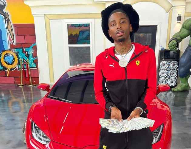 Funny Mike showcases his luxurious red car